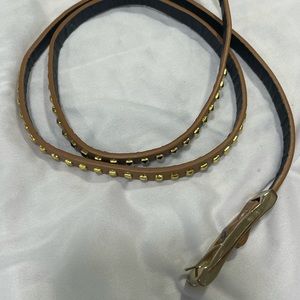 Light brown belt with gold studs